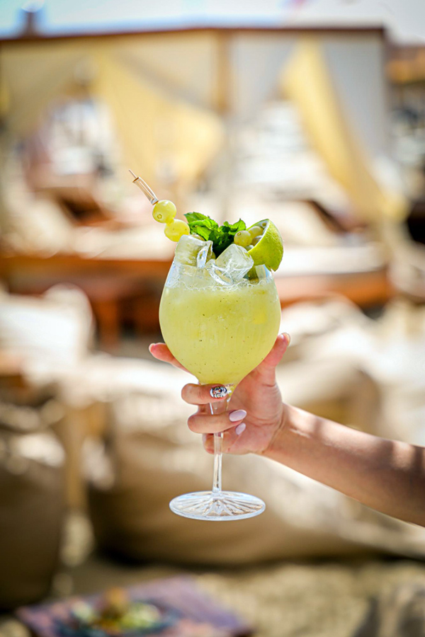 Refreshing Summer Cocktail with Lime and Grapes