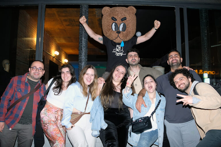 Group photo at the soft opening of Teddy Beer on 25th May, featuring a mascot and smiling guests